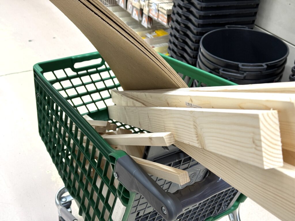 Shopping cart loaded with lumber