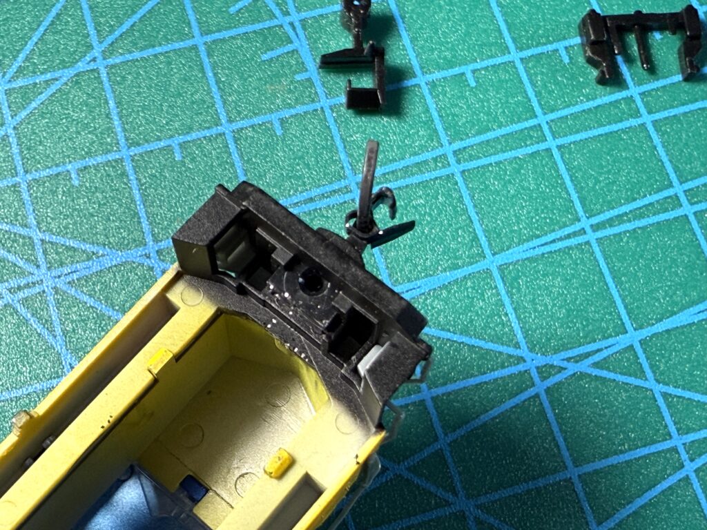 Upgrading from Rapido to Micro-Trains Couplers, pushing in the new Micro-Trains 1015 knuckle coupler