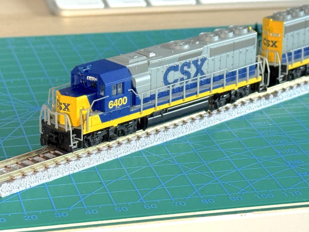 Upgrading from Rapido to Micro-Trains Couplers, two GP40-2 with upgraded couplers