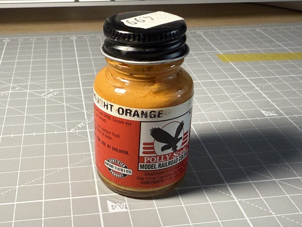 Discontinued SP Daylight Orange Polly Scale paint.