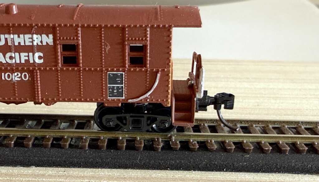 Micro-Trains caboose trucks and body-mount couplers installed